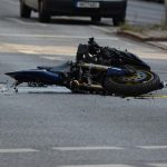horrified!-motorcycle-hanging-from-traffic-lights-after-accident-on-the-surrey-delta-border,-rider-critical