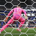 Harry Kane takes a penalty kick