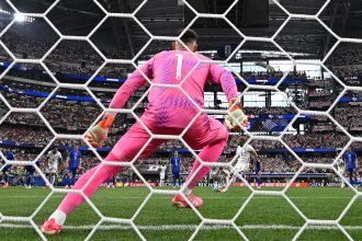 Harry Kane takes a penalty kick