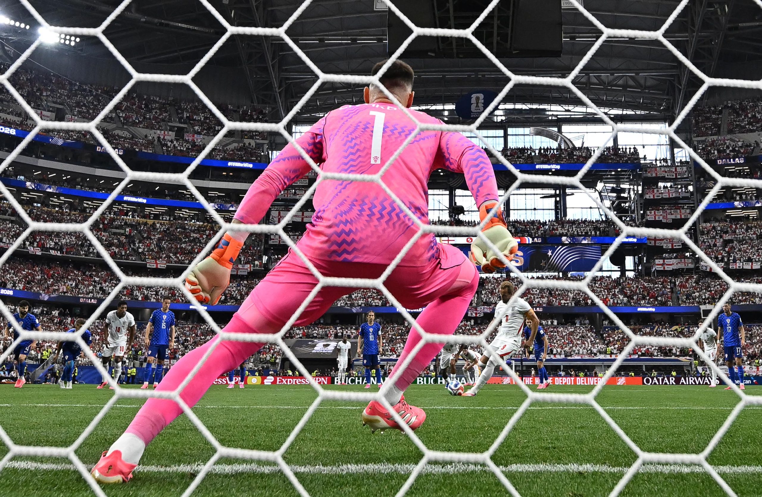 Harry Kane takes a penalty kick