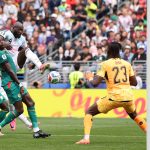 Romelu Lukaku shoots toward the Senegal goal
