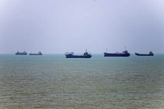 *In this photograph obtained from Iran's ISNA news agency on June 18, 2026, vessels are anchored in Bandar Abbas